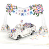 Hochzeitsauto mit "Just Married" Girlande Pop-Up